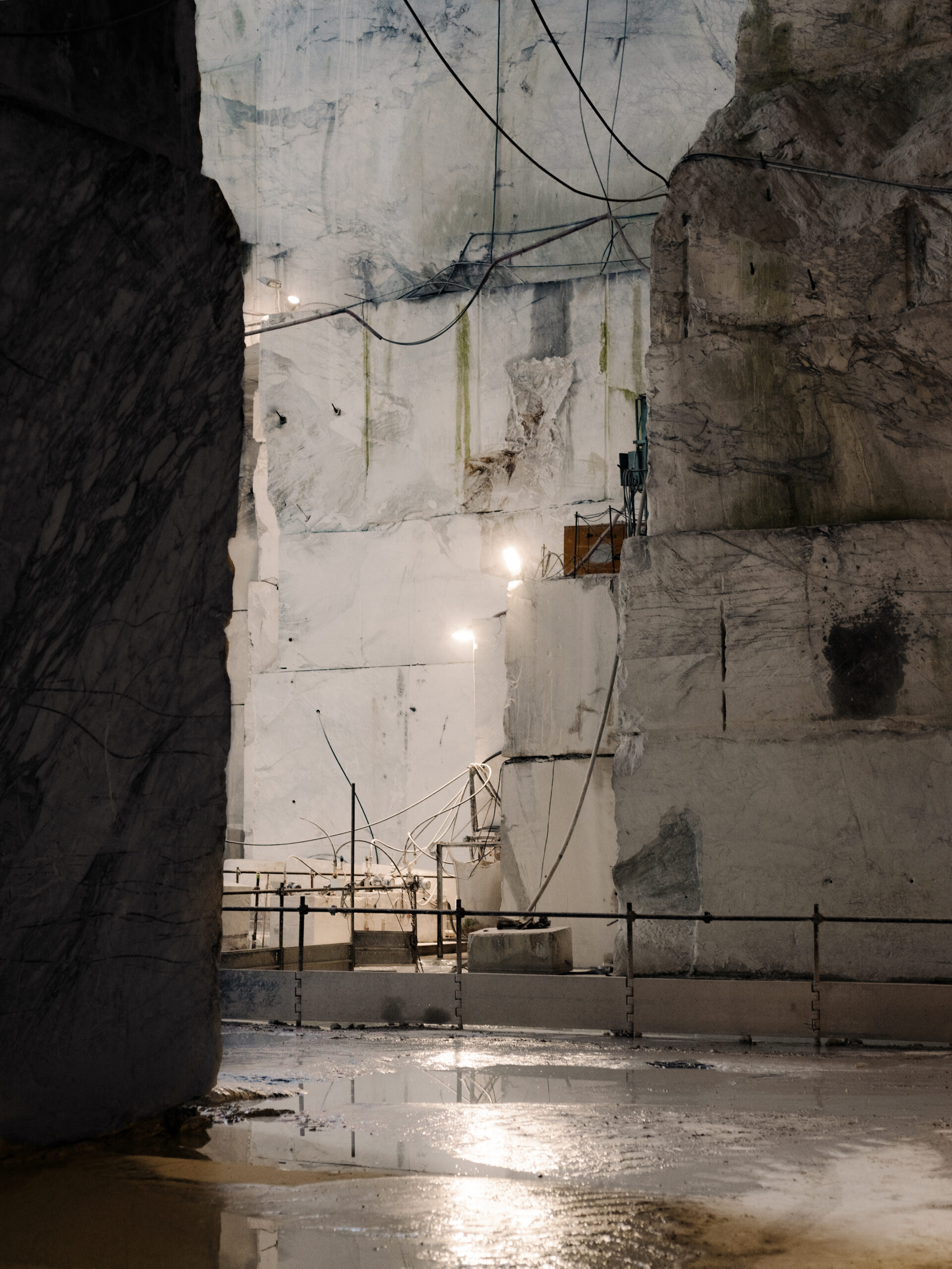 moody dimly lit Carrara marble quarry